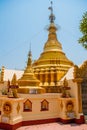 Golden stupa. Snake Pagoda in the town of Bago, Pegu. Myanmar. Burma.
