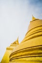 Golden Stupa of Temple of the Emerald Buddha.  Wat Phra Si Rattana Satsadaram.  Wat Phra Kaew. landmark of Bangkok Thailand with Royalty Free Stock Photo