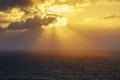 Golden sun rays on the sea at sunset Royalty Free Stock Photo