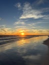 Golden sun setting with reflections over the Gulf of Mexico Miramar Beach Florida Royalty Free Stock Photo