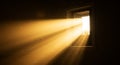 Golden sunlight streams through a small, rectangular window, illuminating floating