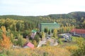 Golden autumn in the Altai region in Russia. Beautiful landscape - road in autumn forest