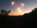 Golden sunrise with angelic clouds photographed at Windmill farm, Drakensberge, South Africa