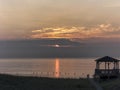 Line of Pelicans Over Ocean Sunrise on the Outer Banks of North Carolina Royalty Free Stock Photo