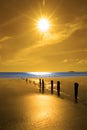 Golden sunrise over the beach and breakers