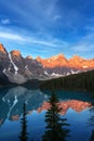 Golden Sunrise Over the Canadian Rockies at Moraine Lake in Canada Royalty Free Stock Photo