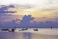 Sunrise over boats in silhouette on ocean in Bali Royalty Free Stock Photo