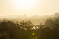 Golden sunrise in Prague taken from the Letna park, with cityscape and the Vltava river on the horizon Royalty Free Stock Photo