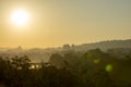 Golden sunrise in Prague taken from the Letna park, with cityscape and the Vltava river on the horizon Royalty Free Stock Photo