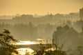 Golden sunrise in Prague taken from the Letna park, with cityscape and the Vltava river on the horizon Royalty Free Stock Photo