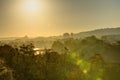 Golden sunrise in Prague taken from the Letna park, with cityscape and the Vltava river on the horizon Royalty Free Stock Photo