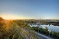 Golden sunrise in Prague taken from the Letna park, with cityscape and the Vltava river on the horizon Royalty Free Stock Photo