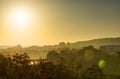 Golden sunrise in Prague taken from the Letna park, with cityscape and the Vltava river on the horizon Royalty Free Stock Photo