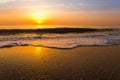 Golden sunrise sunset over the sea ocean waves Royalty Free Stock Photo