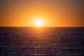 Golden sunrise sunset over the sea waves. Calm ocean water. Royalty Free Stock Photo