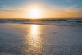 Golden sunset on the beach. Beautiful seascape in soft blue and yellow colors Royalty Free Stock Photo