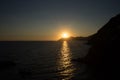 Golden sunset at the cliff at the Italian Riviera in the Village of Riomaggiore, Cinque Terre, Italy Royalty Free Stock Photo