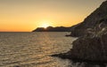 Golden sunset at the cliff at the Italian Riviera in the Village of Riomaggiore, Cinque Terre, Italy Royalty Free Stock Photo