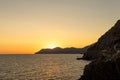 Golden sunset at the cliff at the Italian Riviera in the Village of Riomaggiore, Cinque Terre, Italy Royalty Free Stock Photo