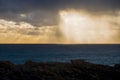 Golden sunset light rays in Injidup beach Western Australia Royalty Free Stock Photo