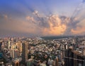 Sunset lightbeam with Bangkok city of cityscape skyline with skyscraper building background in Central business district