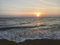 golden sunset over the Andaman ocean and smooth sea waves Royalty Free Stock Photo