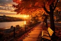 Golden sunset over city highlights vibrant fall foliage and tranquility