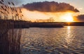 Golden sunset over the lake in early spring Royalty Free Stock Photo