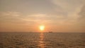 Golden sunset over the sea and vessel Royalty Free Stock Photo