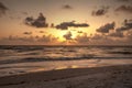 Golden sunset over the white sand of Pass Beach Royalty Free Stock Photo