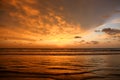 Golden sunset reflecting on the ocean waves Royalty Free Stock Photo