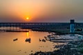 Golden Sunset with River & Bridge