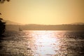 Golden sunset with sailboat on Lake Lanier Royalty Free Stock Photo