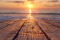 Golden Sunset View Along Weathered Wooden Pier Leading to Horizon Over Calm Sea Royalty Free Stock Photo