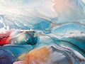 Abstract fluid art painting background alcohol ink technique. Ocean in the sunset lights. Wind blowing waves. Royalty Free Stock Photo