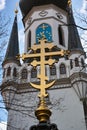 Golden cross symbol at church tower ornamental decoration