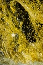 Golden tannins in a closeup of a waterfall in Connecticut Royalty Free Stock Photo