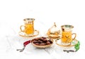 Golden tea cups dates rosary beads decoration Ramadan kareem Royalty Free Stock Photo