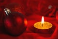 Golden tea light candle with christmas decorations Royalty Free Stock Photo