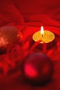 Golden tea light candle with christmas decorations Royalty Free Stock Photo