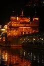 The Golden Temple at Amritsar, Punjab, India, the most sacred icon and worship place of Sikh religion. Illuminated in the night, . Royalty Free Stock Photo