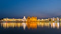 The Golden Temple at Amritsar, Punjab, India, the most sacred icon and worship place of Sikh religion. Illuminated in the night, r Royalty Free Stock Photo