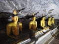 The golden temple of Dambulla is world heritage site and has a total of a total of 153 Buddha statues, three statues of Sri Lankan Royalty Free Stock Photo