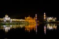 The Golden Temple or Harmandir Sahib at night, abode of God gurdwara located in the city of Amritsar, Punjab, India Royalty Free Stock Photo