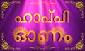 Golden Text in Malayalam for Happy Onam.