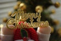 Golden text Mery Christmas in Santa Claus hands, New Year Royalty Free Stock Photo