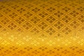 Golden textile pattern background. Royalty Free Stock Photo