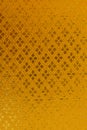 Golden textile pattern background. Royalty Free Stock Photo