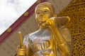 Golden thai monk statue in temple Royalty Free Stock Photo