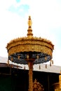 Golden tiered umbrella